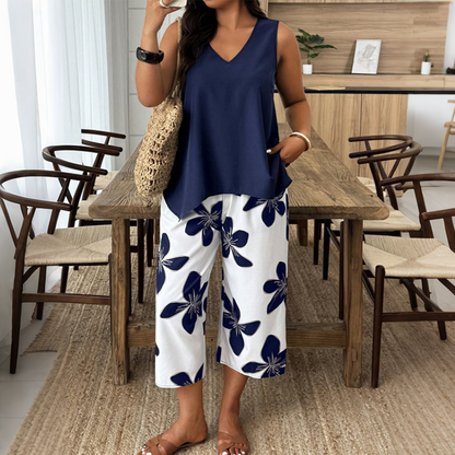 🌸 40% OFF! ✨ Women's Asymmetrical Top & Floral Print Capri Pants Set – Versatile, Vibrant, Comfortable 🌺