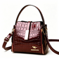 👜 Limited-time 50% off! Shiny crocodile-print handbag with gold hardware 💼